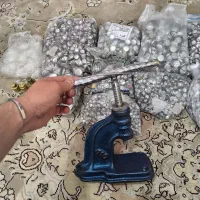 دستگاه پرس دکمه و خرج کار