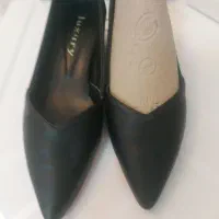 یک جفت کفش مشکی کاملانو کارتهران