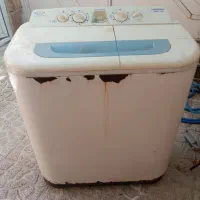 یک عدد لباسشویی 8کیلویی  دوقلو پاکشوما