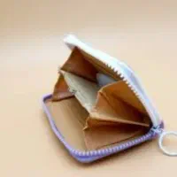 کیف پول صورتی با کارت به نام ابراهیمی