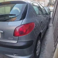 پژو 206مدل 1390 درحد شاسی پلمپ بدون آفتاب سوختگی