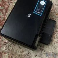 دو عدد دستگاه پرینتر HP و اسکنر کانن