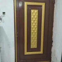 رنگ امیزی درب وپنجره وساختمان