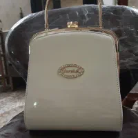 کیف ورنی مشکی،کیف ورنی کرم|کیف، کفش، کمربند|قم, چهل درخت|دیوار