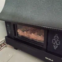 بخاری نیک کالاگاز فرش میز تلوزیون کابینت ظرف غذا