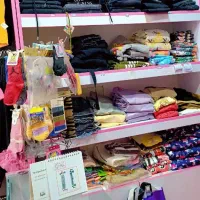 حراج کلیه لباسهای بچگانه