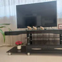 میز تلویزیون شیشه‌ای