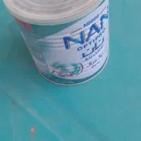 مقداری قوطی ۱کیلویی با درب دونه ای ۱۰ هزار