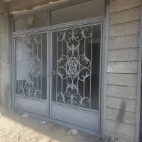 فروش درب پارکینگ به ابعاد دونیم دردونیم