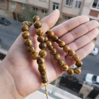 تسبیح کهربا رگه دار