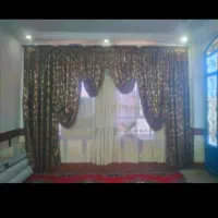 پرده با چوبش