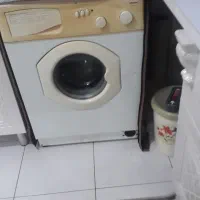 ساعت و میزغذاخوری و کمدلباسو لباسشویی و بوفه