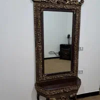 ساعت و آینه