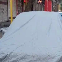 کاور خودرو ۲۰۷ و ۲۰۶ چهار فصل ضد اب داخل کرک