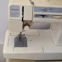 چرخ گلدوزی سینجرو اتوپرس