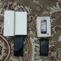 گوشی p8lite.  وگوشی y330