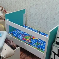 تخت کودک کنار مادر