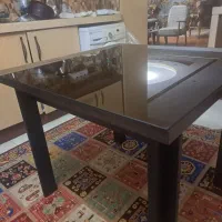 میز نهارخوری ۴نفره پایه فلزی با شیشه برنز