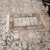 فرش اتاق همراه با پادری نونو بدون زدگی