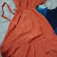 تعداد زیادی لباس