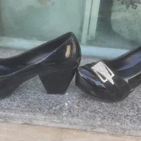 کفش مجلسی|کیف، کفش، کمربند|قم, وادی السلام|دیوار