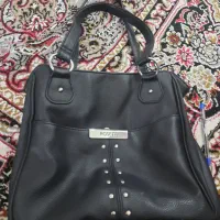 کیف مشکی|کیف، کفش، کمربند|کاشان, شاهد|دیوار