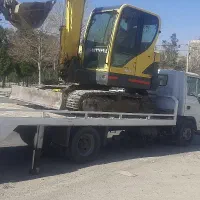 راننده بیل. مینی بیل
