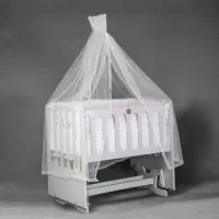 گهواره کنار تخت مادر