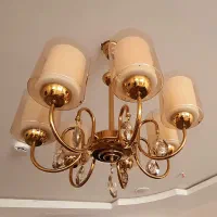 یک جفت لوستر ۷ شاخه یک جفت دیوار کوب