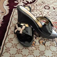 صندل|کیف، کفش، کمربند|مسجد سلیمان, |دیوار