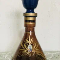 شیشه قلیان و کله سفالی