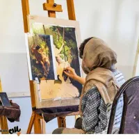 استخدام نقاش هنری برای رنگ آمیزی مجسمه