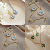 دستبند و گردنبد رزینی گل آبی ظریف و زیبا