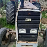 تراکتور مدل ۶۴ با وسایل کشاورزی