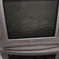 تلویزیون ۲۱ اینچ ال جی همراه با میز|تلویزیون و پروژکتور|مشهد, جانباز|دیوار