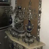 ساعت شمعدان برنجی هرگونه در محل شما برمیدارم