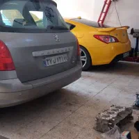 همکاری و مدیریت در تعمیرگاه خدمات خودرو مکانیکی