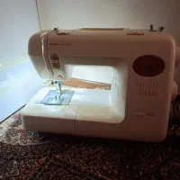 چرخ خیاطی برادر به همراه هدیه ببر