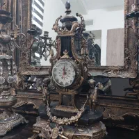 آینه شمعدان و ساعت