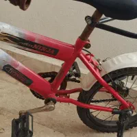 دوچرخه بچگانه و قالپاق پژو