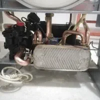 پکیج 24هزار مدل M بلوکه برنجی  تمیز وسرویس شده