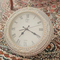 ساعت دوطرفه وموتوره چرخشی