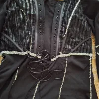 لباس مجلسی|لباس|نیشابور, گنبد سبز|دیوار