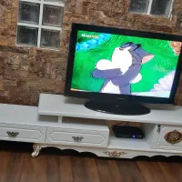 تلویزیون 40  اینچ lcd با میز تلویزیون