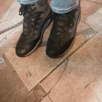 پوتین خارجی|کیف، کفش، کمربند|آشخانه, |دیوار