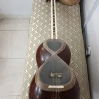 تار ساخت استاد رضا ژاله قدیمی|سازهای سنتی|گرگان, |دیوار