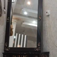 آیینه شمعدان‌. میز تلویزیون .بوفه . ساعت ایستاده