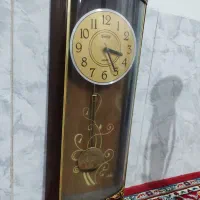 ساعت دیواری قهوه ای