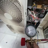 نصاب تعمیر کار سرویس و گاز گیری انواع کولر گازی