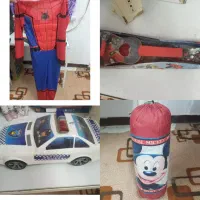 ماشین پلیس ، گیتار ، لباس مرد عنکبوتی